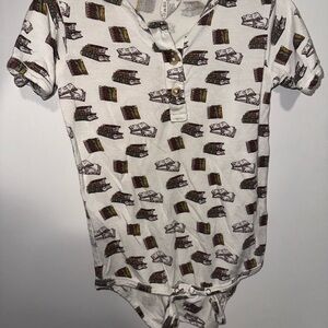 Kate Quinn Cream Bodysuit with Book Pattern